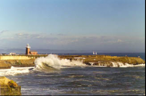 Lighthouse:beach:waves